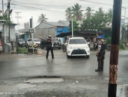 Polisi Tetap Siaga di Tengah Hujan Deras pastikan lalu lintas aman